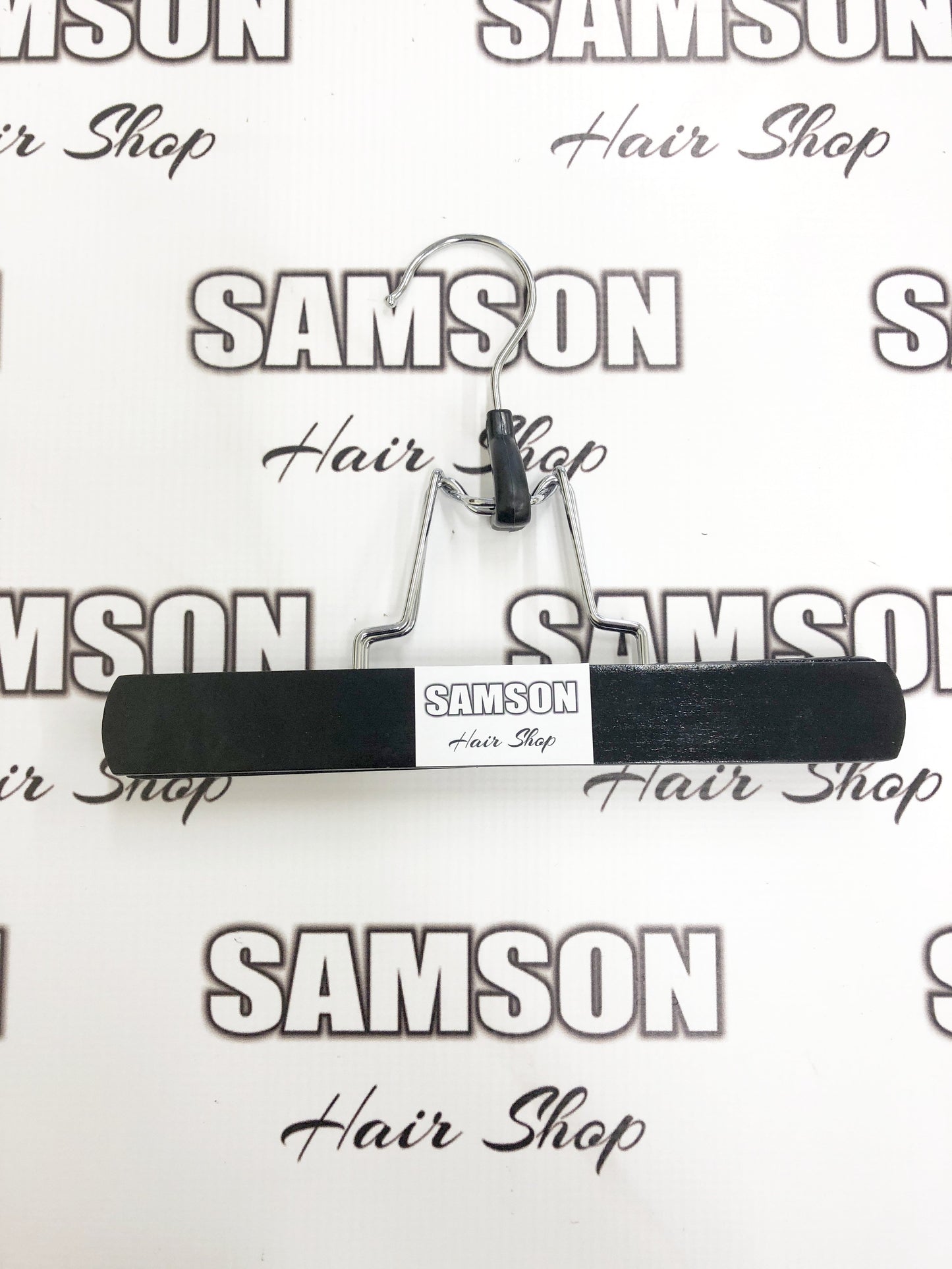 Storage hanger with pouch