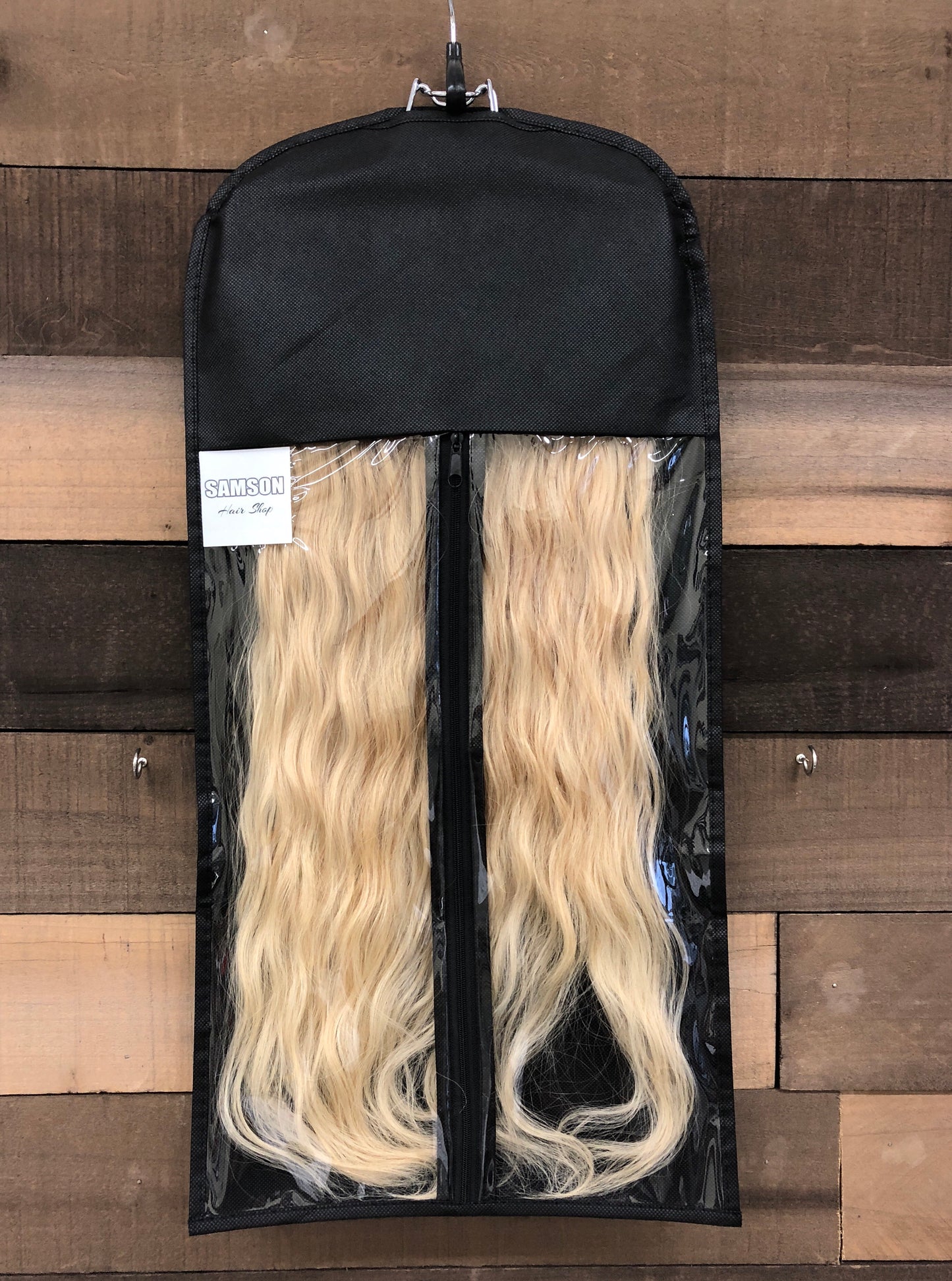 Storage hanger with pouch